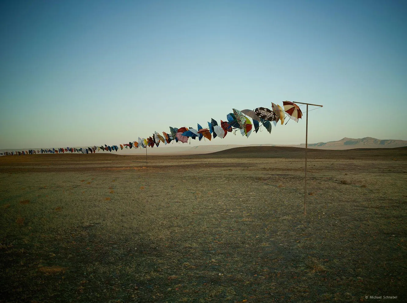 Umbrellas - shot on a desert location, produced by Steel Productions
